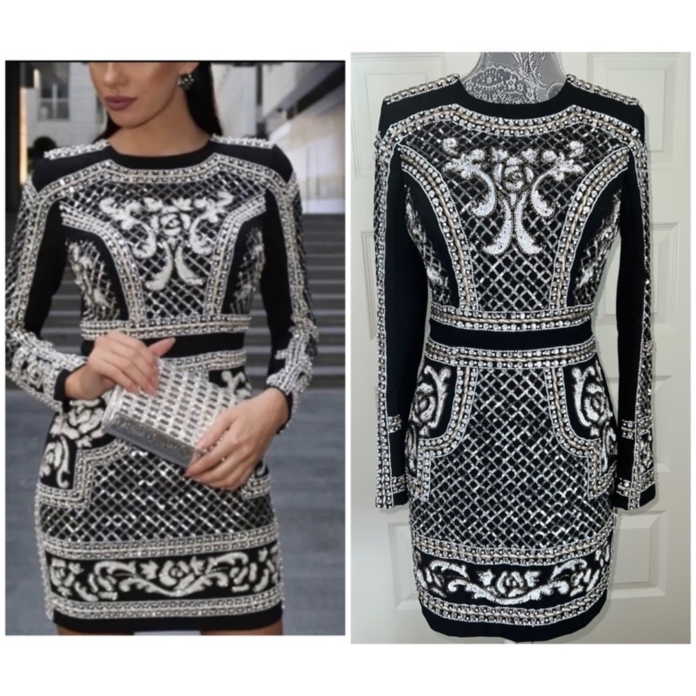 BEBE long sleeve, black and Silver color dress
Full zip up the back. Size 6